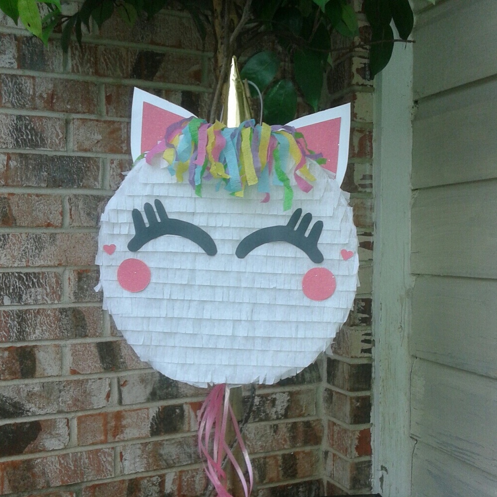 Beautiful unicorn pinatas party